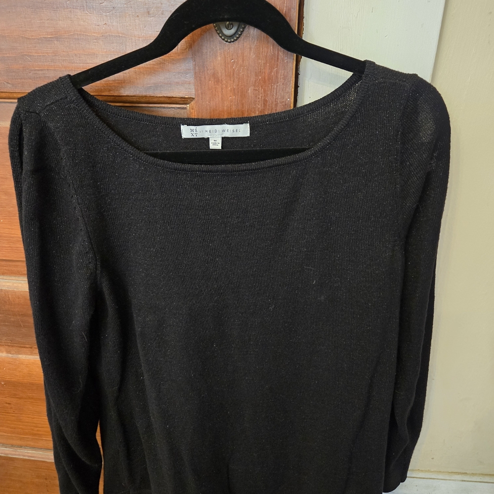 Black Long Sleeve Sweater Sleeves Have Gathered Buttons So Skin Will Show Some.